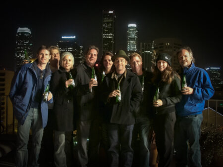 film crew posing on roof at nighttime in Los Angeles